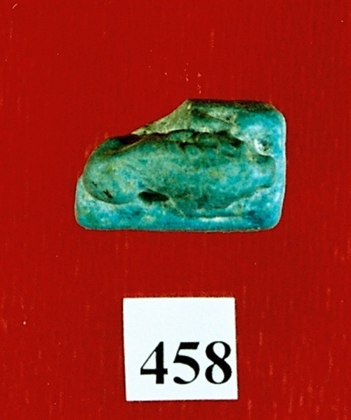 Amulet of a lion in laying position